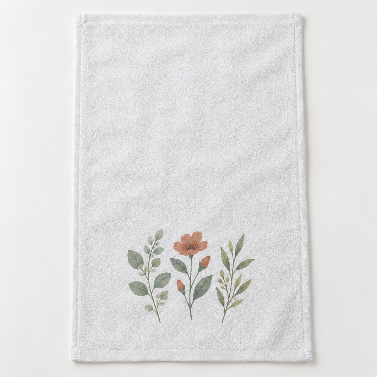 White hemmed fingertip towel with an example botanical custom print